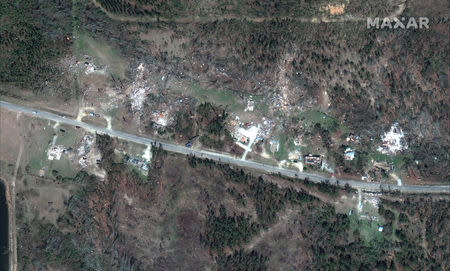 Damage to a home on County Road 39 is seen after a series of tornadoes struck Lee County, Alabama, U.S. March 3, in this handout satellite image captured March 6, 2019. satellite image ©2019 DigitalGlobe, a Maxar company/Handout via REUTERS