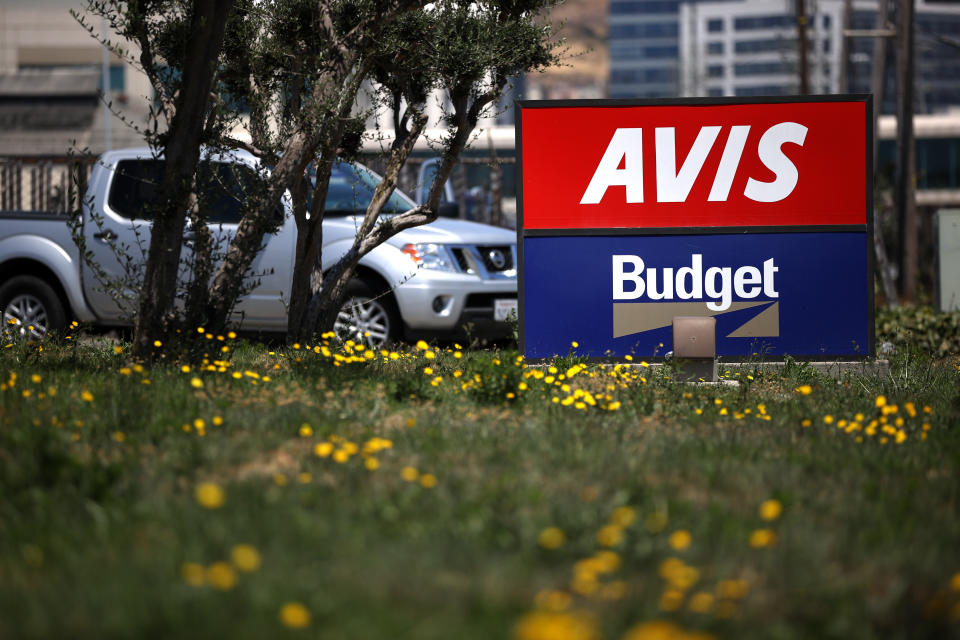 SOUTH SAN FRANCISCO, CALIFORNIA - JULY 28: A sign is posted in front of an Avis Budget rental car office on July 28, 2020 in South San Francisco, California. Avis Budget Group reported second quarter earnings with an adjusted net loss of $388 million and a 67 percent decline in revenues compared to one year ago. (Photo by Justin Sullivan/Getty Images)