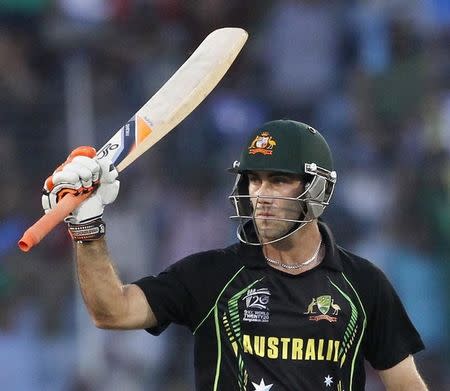 Australia's Glenn Maxwell celebrates after scoring a half century against Pakistan during their match of ICC Twenty20 World Cup at the Sher-E-Bangla National Cricket Stadium in Dhaka March 23, 2014. REUTERS/Andrew Bira