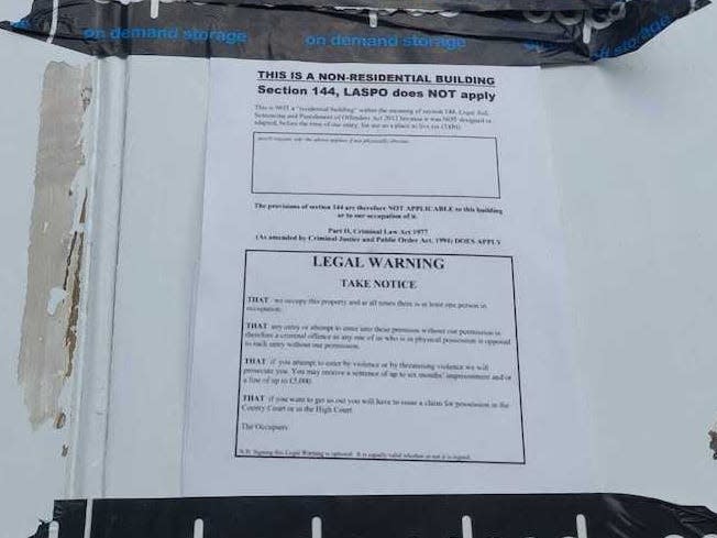 A legal notice taped to the outside of York & Albany, Gordon Ramsay's restaurant and hotel in Camden, London, on April 15, 2024, as squatters occupy it.