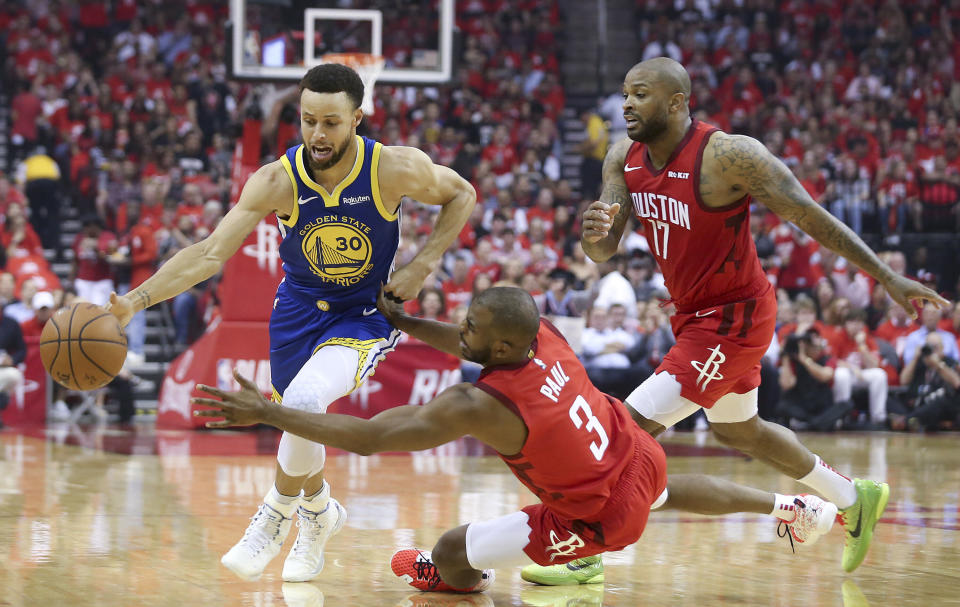 May 10, 2019; Houston, TX, USA; Golden State Warriors guard Stephen Curry (30) dribbles past Houston Rockets guard Chris Paul (3) in the first quarter in game six of the second round of the 2019 NBA Playoffs at Toyota Center. Mandatory Credit: Thomas B. Shea-USA TODAY Sports