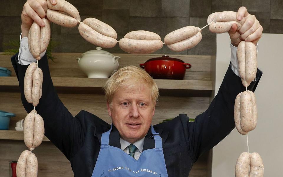 Boris Johnson at Heck sausages - PA