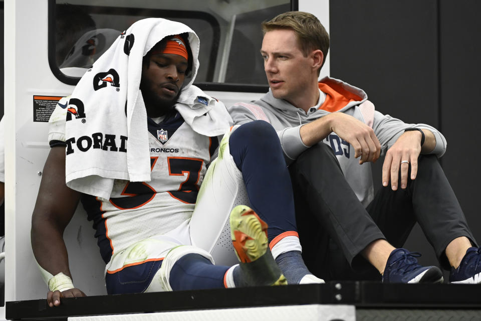 Denver Broncos running back Javonte Williams (33) is carted off the field during the second half of an NFL football game against the Las Vegas Raiders, Sunday, Oct. 2, 2022, in Las Vegas. Javonte Williams is out for the year after tearing his right ACL in Denver's 32-23 loss to the Las Vegas Raiders, a person with knowledge of the medical results told The Associated Press, Monday, Oct. 3, 2022. (AP Photo/David Becker)