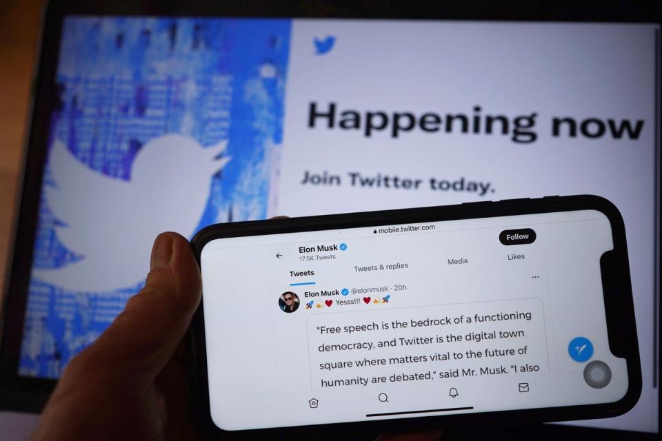 The Twitter social media app displaying a tweet by Elon Musk on a mobile phone (PA) (PA Wire)