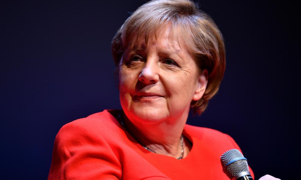 Angela Merkel speaks to a German magazine at an event in Berlin.