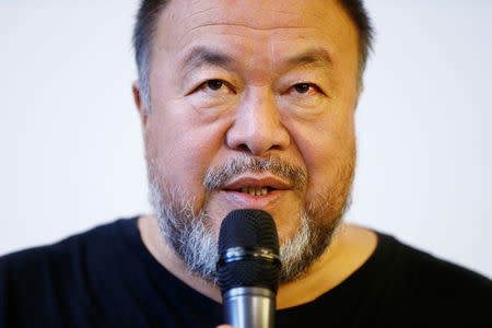 Chinese artist and free-speech advocate Ai Weiwei attends a news conference ahead of an exhibition titled "Ai Weiwei: By the way, it's always the others" at the Musee Cantonal des Beaux Arts in Lausanne, Switzerland September 20 2017. REUTERS/Pierre Albouy