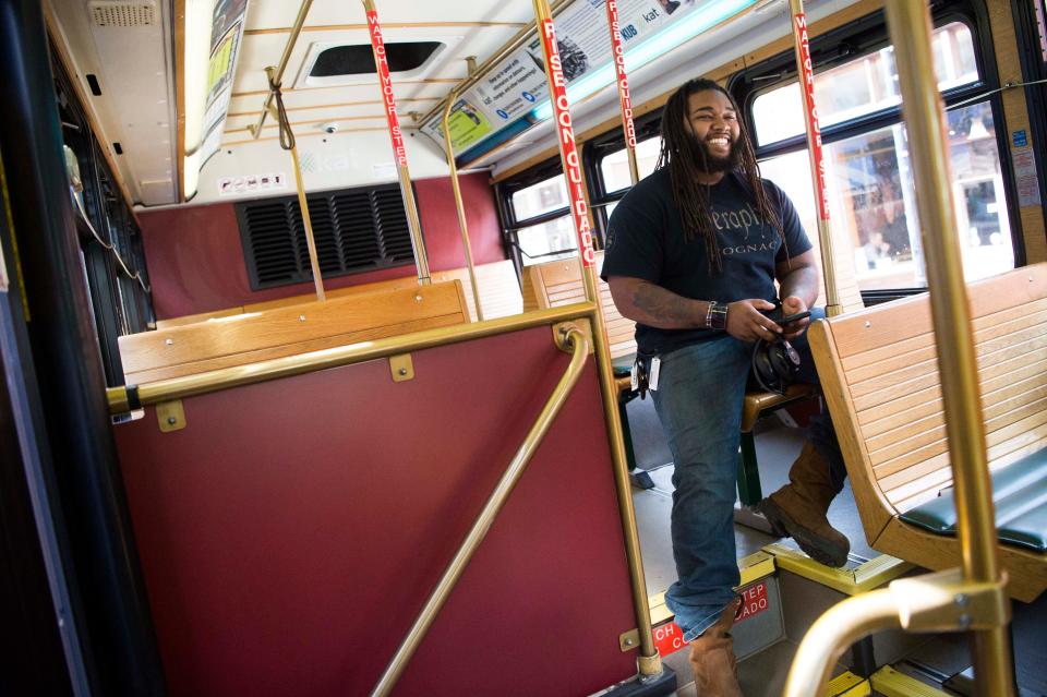 Knoxville resident Weston Phillips rides the green line trolley to Old City on April 17, 2019. The trolley and the KISS Caboose are two free forms of transportation for people visiting or living in downtown Knoxville.