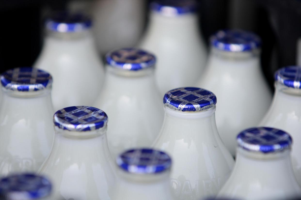 Dairy giant Arla says milk supplies could be disrupted by a lack of lorry drivers (PA)