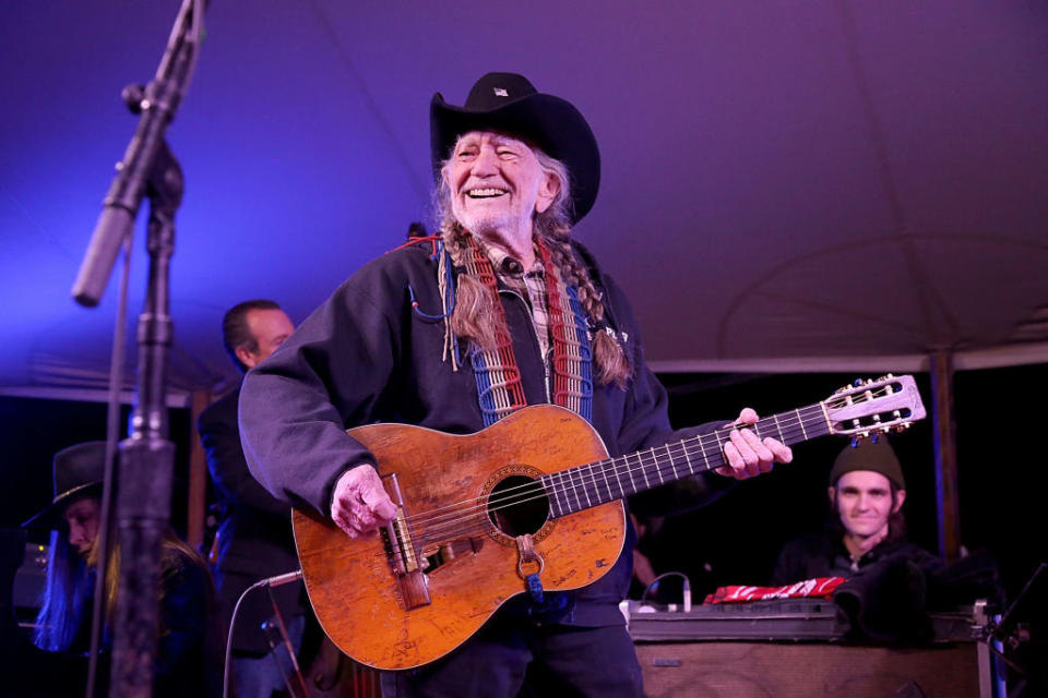 Willie Nelson performs at a Farm Aid benefit concert on March 14 in Texas. (Photo: Gary Miller/Getty Images)