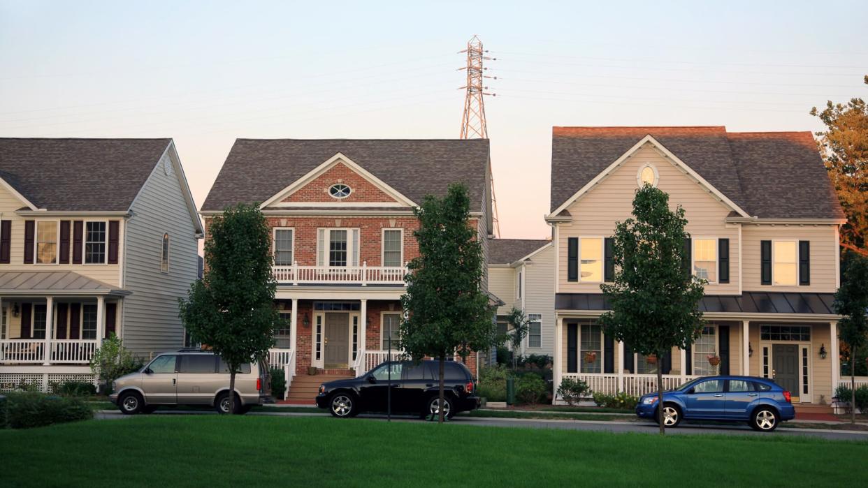 Blue, Car, Clear Sky, Color Image, Community, Day, Electricity Pylon, Grass, Horizontal, House, Mid Distance, Middle Class, Nobody, Outdoors, Pennsylvania, Pittsburgh - Pennsylvania, Residential District, Sky, Suburb, Three Objects, Tree, USA, Working Class, green