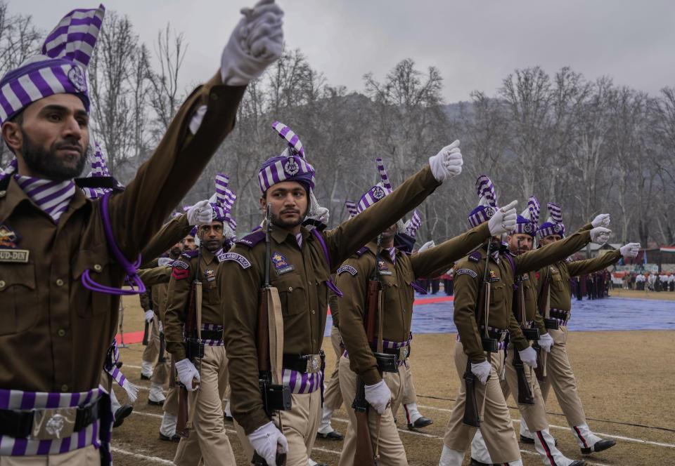 Indian police personnel march as they participate in a Republic Day parade in Srinagar, Indian controlled Kashmir, Thursday, Jan. 26 , 2023. (AP Photo/Mukhtar Khan)