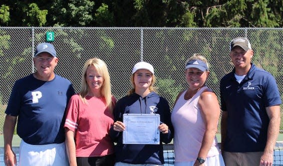 Petoskey senior MaRynn Corey (middle) earned the annual Dree Lo Memorial Scholarship and will compete at Adrian College next season.