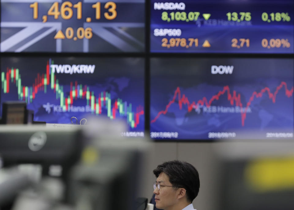 A currency trader watches computer monitors at the foreign exchange dealing room in Seoul, South Korea, Monday, Sept. 9, 2019. (AP Photo/Lee Jin-man)