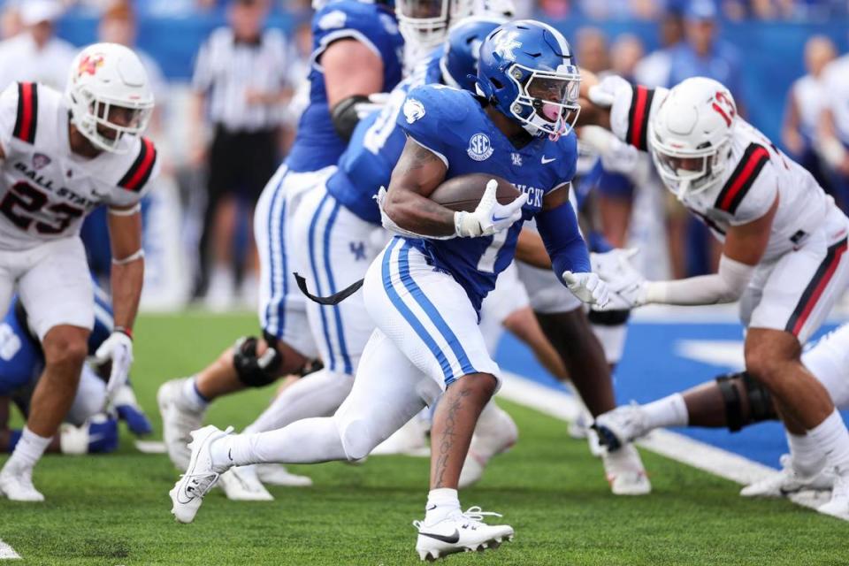 Kentucky’s Ray Davis (1) runs for the team’s first touchdown of the season during Saturday’s win against Ball State. Davis, a transfer from Vanderbilt, carried 14 times for 112 yards and two TDs in his UK debut.