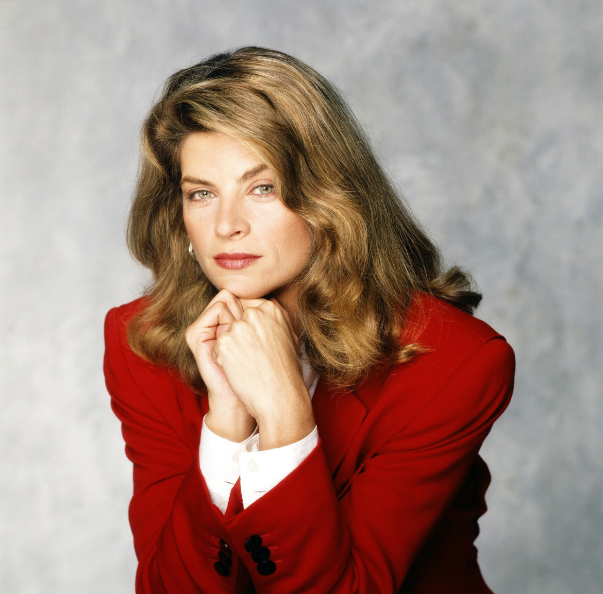 Kirstie Alley in a red blazer from her time in 