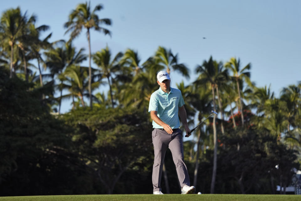 Russell Henley watches his birdie putt come up short on the 10th green during the first round of the Sony Open golf tournament, Thursday, Jan. 12, 2023, at Waialae Country Club in Honolulu. (AP Photo/Matt York)