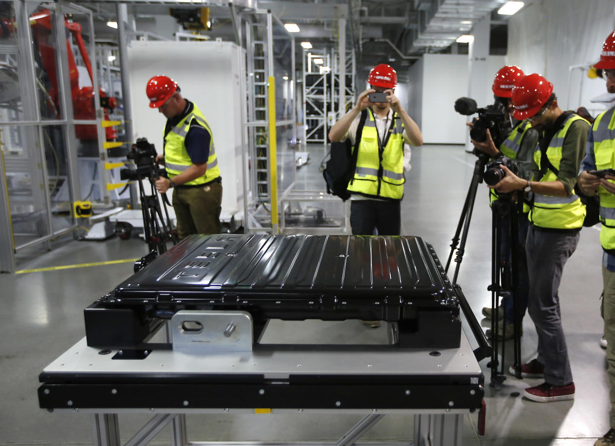 A Tesla battery pack is displayed during a media tour of the new Tesla Motors Inc., Gigafactory Tuesday, July 26, 2016, in Sparks, Nev. It's Tesla Motors biggest bet yet: a massive, $5 billion factory in the Nevada desert that could almost double the world's production of lithium-ion batteries by 2018. (AP Photo/Rich Pedroncelli)