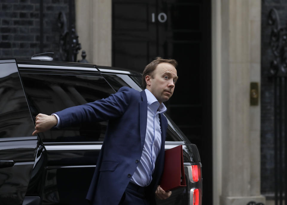 FILE - In this Wednesday, April 29, 2020 file photo, Britain's Health Secretary Matt Hancock arrives in Downing Street in London. The British government has reimposed lockdown restrictions in the English city of Leicester after a spike in coronavirus infections, including the closure of shops that don't sell essential goods and schools. In a statement in Parliament, Health Secretary Matt Hancock said the government won't be recommending that the city joins in the easing of the lockdown in England that is due to take place on Saturday, July 4, which includes the reopening of pubs and restaurants. (AP Photo/Kirsty Wigglesworth, File)