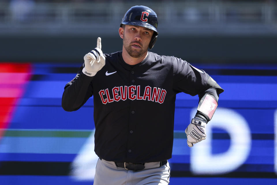 Cleveland Guardians' David Fry celebrates his three-run home run against the Minnesota Twins during the second inning of a baseball game, Saturday, April 6, 2024, in Minneapolis. (AP Photo/Matt Krohn)