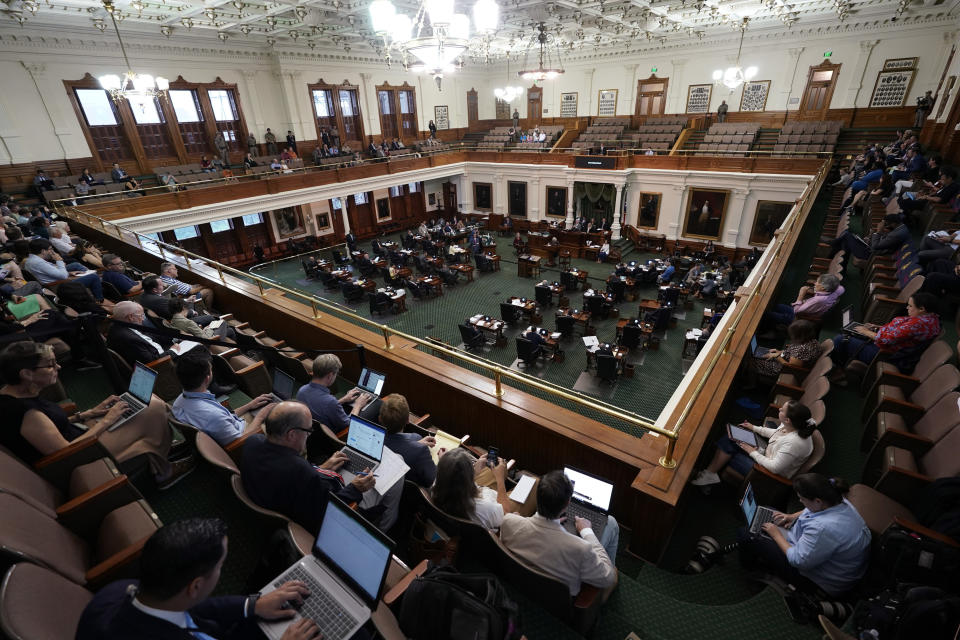 Texas state senators acting as jurors vote on the articles of impeachment against suspended Texas Attorney General Ken Paxton in the Senate Chamber at the Texas Capitol, Saturday, Sept. 16, 2023, in Austin, Texas. (AP Photo/Eric Gay)