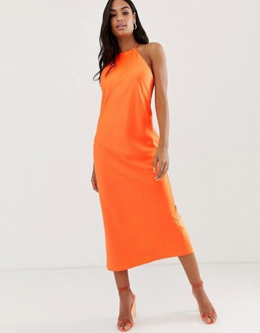 <strong><a href="https://us.asos.com/asos-design/asos-design-midi-slip-dress-with-high-neck-in-neon/prd/11210286" target="_blank" rel="noopener noreferrer">Get the ASOS Design midi slip dress for $45.</a></strong>