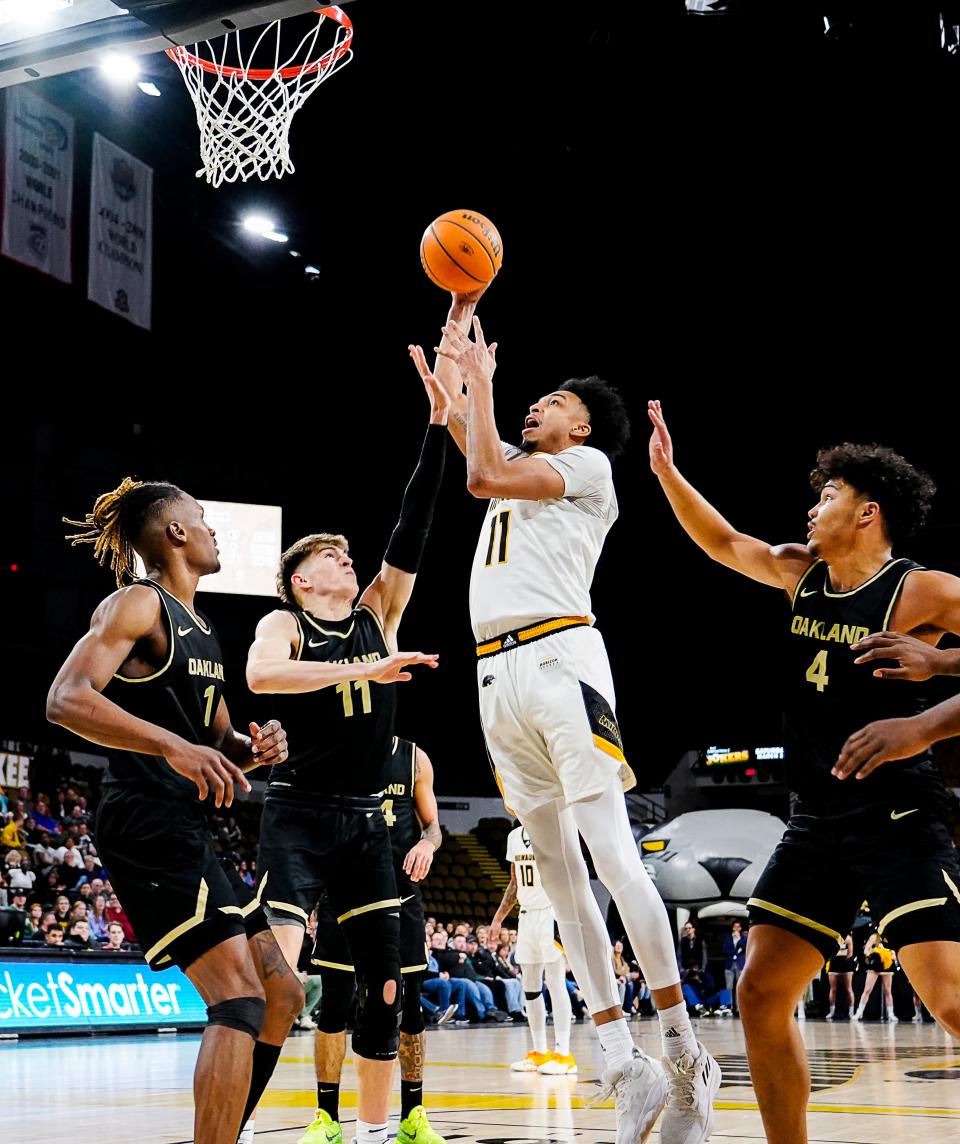 Milwaukee forward Vin Baker Jr. (11) scores during the second half of their game against Oakland on Saturday February 11, 2023 at the UW-Milwaukee Panther Arena in Milwaukee, Wis.