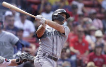 Seattle Mariners' Adam Frazier hits a two-run home run in the sixth inning of a baseball game against the Boston Red Sox, Sunday, May 22, 2022, in Boston. (AP Photo/Steven Senne)