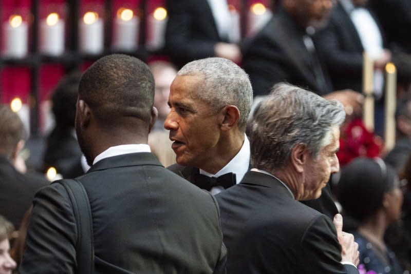 Former U.S. President Barack Obama greets Antony Blinken, the U.S. secretary of state, during a state dinner for Kenya's president at the White House in Washington on Thursday. Photo by Al Drago/UPI