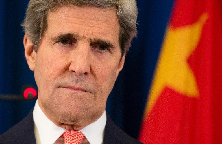 US Secretary of State John Kerry listens to a question during a news conference in Beijing on February 14, 2014