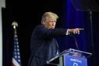 Republican presidential candidate and former President Donald Trump points as he speaks at an annual leadership meeting of the Republican Jewish Coalition, Saturday, Oct. 28, 2023, in Las Vegas. (AP Photo/John Locher)