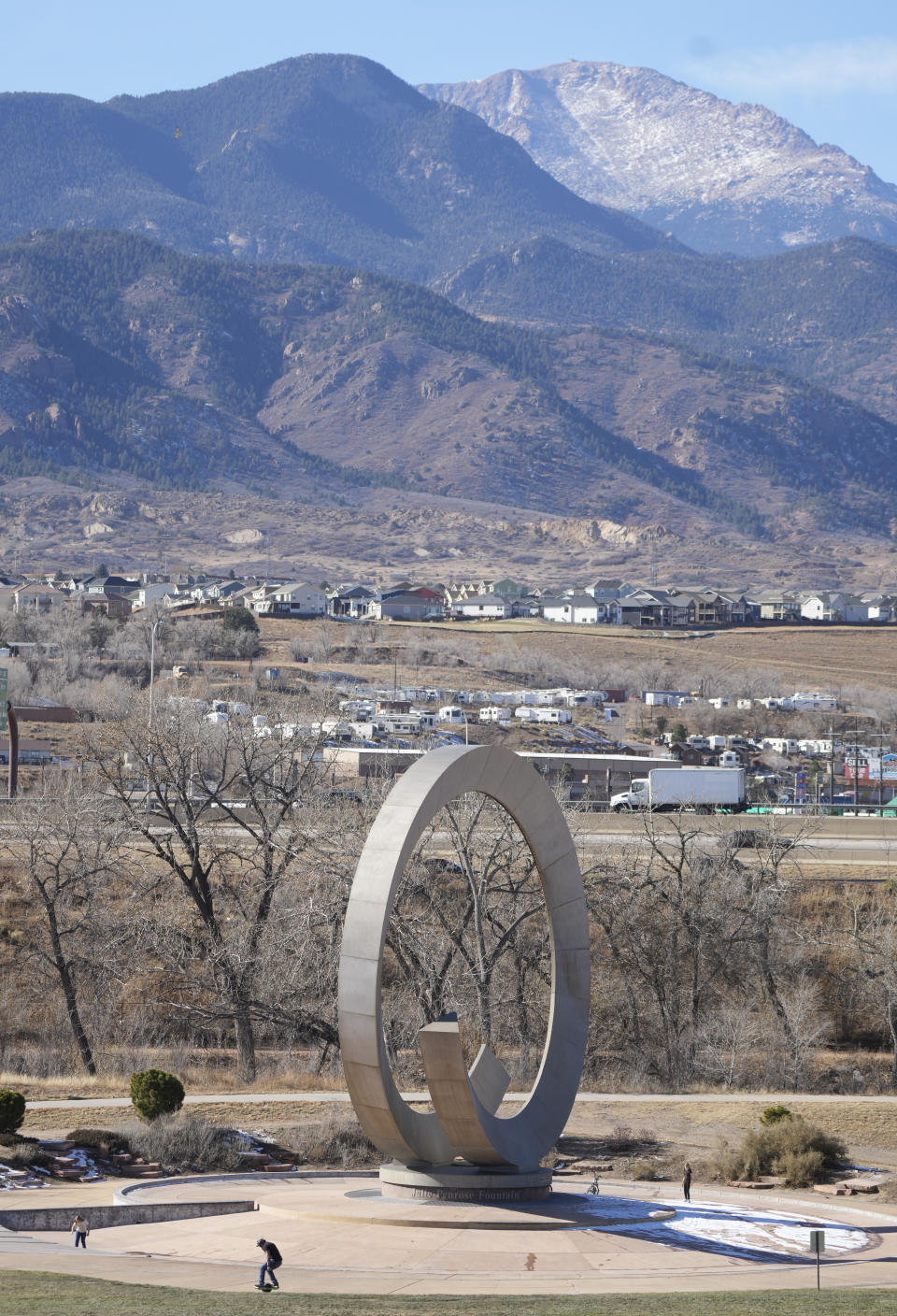 Pike's Peak stands off in the distance over America The Beautiful Park in downtown in Colorado Springs, Colo., Tuesday, Nov. 22, 2022. With a growing and diversifying population, the city nestled at the foothills of the Rockies is a patchwork of disparate social and cultural fabrics. But last weekend’s shooting has raised uneasy questions about the lasting legacy of cultural conflicts that caught fire decades ago and gave Colorado Springs a reputation as a cauldron of religion-infused conservatism, where LGBTQ people didn't fit in with the most vocal community leaders' idea of family values (AP Photo/David Zalubowski)