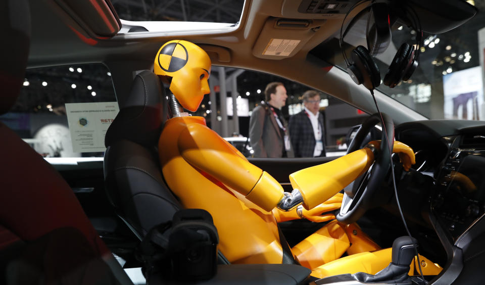 A crash test model is displayed inside a 2018 Toyota Camry on the floor of the New York Auto Show in the Manhattan borough of New York City, New York, U.S., March 29, 2018. REUTERS/Shannon Stapleton