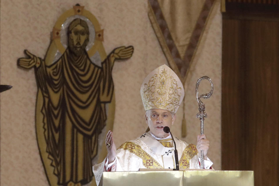 In this Sunday, April 12 2020 photo, San Francisco Archbishop Salvatore Cordileone celebrates Easter Mass, which was live streamed, at St. Mary's Cathedral in San Francisco. Cordileone hopes his fellow bishops, at their upcoming national meeting in June, will agree to send a strong message of disapproval to Catholic politicians who advocate for abortion rights. (AP Photo/Jeff Chiu)