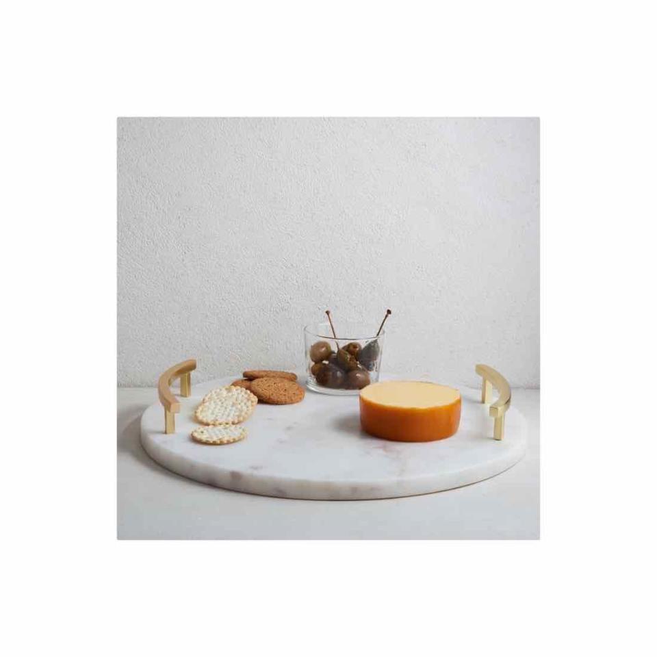 <p><a href="https://go.redirectingat.com?id=74968X1596630&url=https%3A%2F%2Fwww.westelm.com%2Fproducts%2Fmarble-brass-round-cheese-board-e1736&sref=https%3A%2F%2Fwww.oprahdaily.com%2Flife%2Frelationships-love%2Fg31879185%2Fwedding-gift-ideas%2F" rel="nofollow noopener" target="_blank" data-ylk="slk:Shop Now;elm:context_link;itc:0;sec:content-canvas" class="link ">Shop Now</a></p><p>Marble & Brass Round Cheese Board</p><p>westelm.com</p><p>$48.00</p><span class="copyright">West Elm</span>