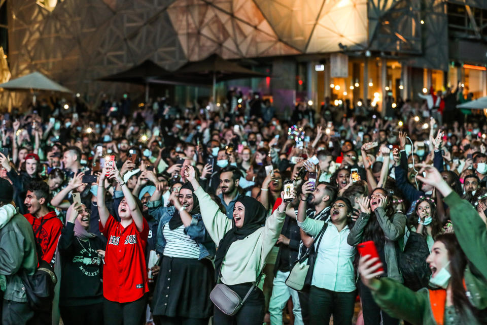 Image: People celebrate as they bring in the New Year at Federation Square during New Year's Eve celebrations (Asanka Ratnayake / Getty Images)