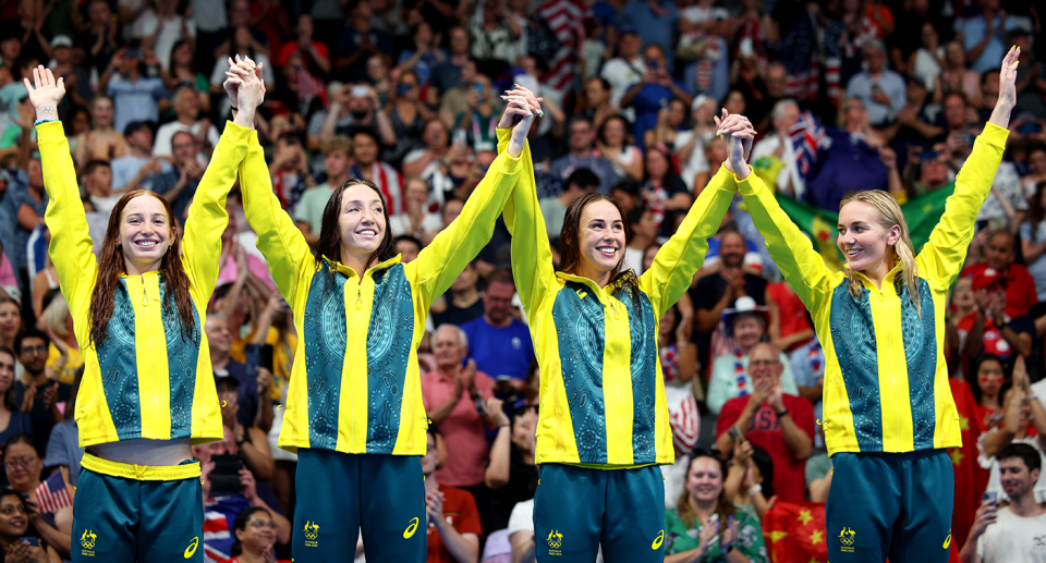 The Aussie women's 4x200m freestyle relay team celebrate their gold medal at the Paris Olympics. Pic: Getty