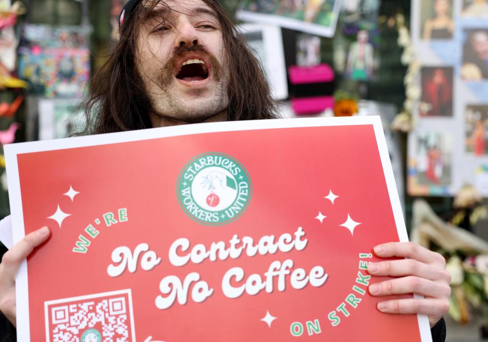 Striking Starbucks worker Kyle Trainer on the annual Red Cup Day on Nov. 17, 2022, in San Francisco.