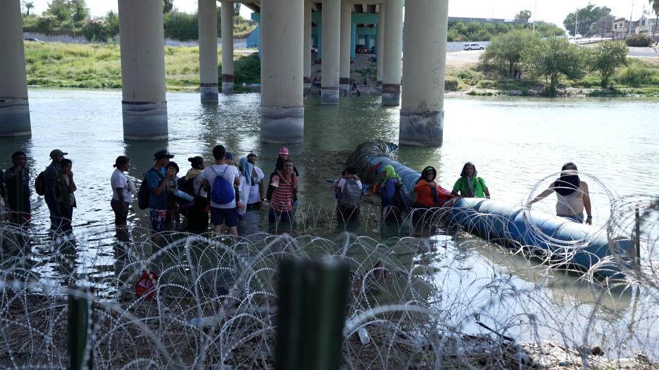 Migrants crossing Rio Grande (Andy Vigañas/NBC News)