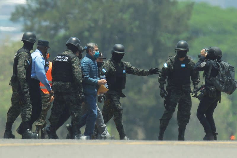 FILE PHOTO: Honduras extradite former President Juan Orlando Hernandez is being transported to the U.S., in Tegucigalpa