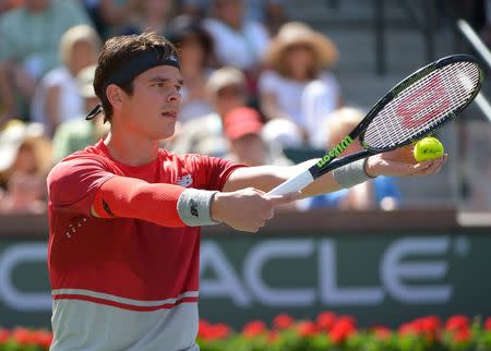 Mar 14, 2016; Indian Wells, CA, USA; Milos Raonic (CAN) during his match against Bernard Tomic (AUS) at the BNP Paribas Open at the Indian Wells Tennis Garden. Raonic won as Tomic was forced to retire in the second set. Mandatory Credit: Jayne Kamin-Oncea-USA TODAY Sports