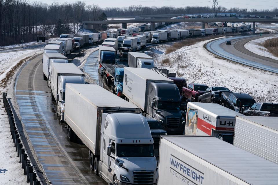 After the Ambassador Bridge was closed due to Canadian anti-vaccine protests, traffic was diverted to the Blue Water Bridge in Port Huron causing miles-long backups on Feb. 9, 2022. From an overpass, the Interstate 94 approach to the Blue Water Bridge heading to Canada was packed with transfer trucks.