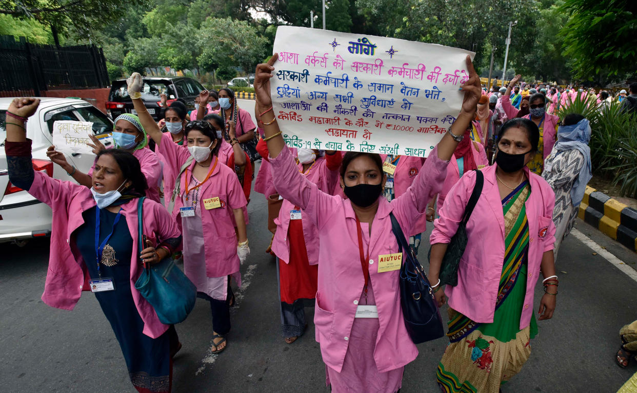 ASHA workers protest against alleged negligence of their workforce by the government on August 9, 2020 in New Delhi. During the protest, ASHA workers demanded payment for their work during the COVID-19 pandemic, saying they have not been paid for the past few months.