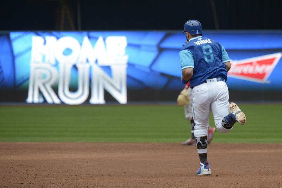 Toronto Blue Jays' Kendrys Morales rounds the bases after hitting a team record-breaking two-run home run against the Philadelphia Phillies during the third inning of a baseball game, Sunday, Aug. 26, 2018, in Toronto. Morales broke the team record for home runs in consecutive games with his seventh straight. (Jon Blacker/The Canadian Press via AP)
