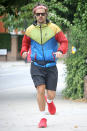 <p>Harry Styles wears a colorful jacket for a Saturday jog in London.</p>