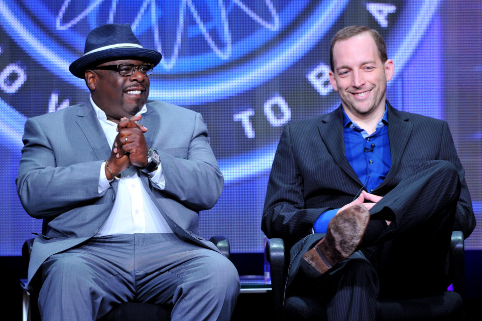 FILE - This Aug. 4, 2013, file photo, shows game show host Cedric "The Entertainer," left, and producer Rick Sirop of "Who Wants To Be A Millionaire" at the Disney/ABC Television Group's 2013 Summer TCA panel in Beverly Hills, Calif. On Sept. 2, the new season of "Who Wants To Be A Millionaire" premieres, ushering in Cedric "The Entertainer" as host. (Photo by Vince Bucci/Invision/AP, File)