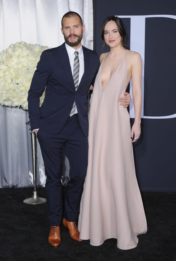 Actors Jamie Dornan and Dakota Johnson attend the premiere of Universal Pictures' 'Fifty Shades Darker' in Los Angeles, California. (Photo: Frank Trapper/Corbis via Getty Images)