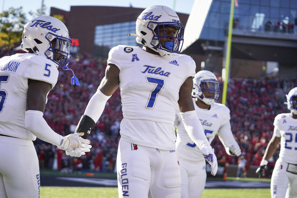 Tulsa safety TieNeal Martin (7) celebrates after intercepting Cincinnati's Desmond Ridder during the first half of an NCAA college football game Saturday, Nov. 6, 2021, in Cincinnati. (AP Photo/Jeff Dean)