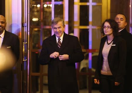 U.S. Senator Mike Johanns (R-NE) (2nd L) departs after a private dinner with fellow Republican senators and U.S. President Barack Obama at a hotel near the White House in Washington March 6, 2013. REUTERS/Jonathan Ernst