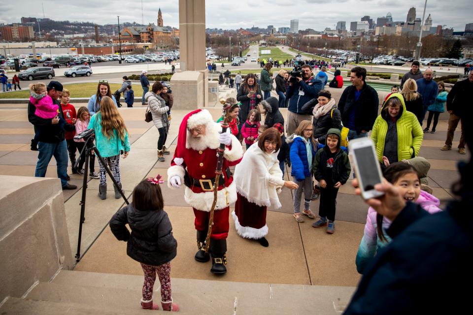 Santa Claus and Mrs. Claus greet families at the Cincinnati Museum Center at Union Terminal in 2019. You can find him at the Public Landing adjacent to Holiday Junction beginning Nov. 26.