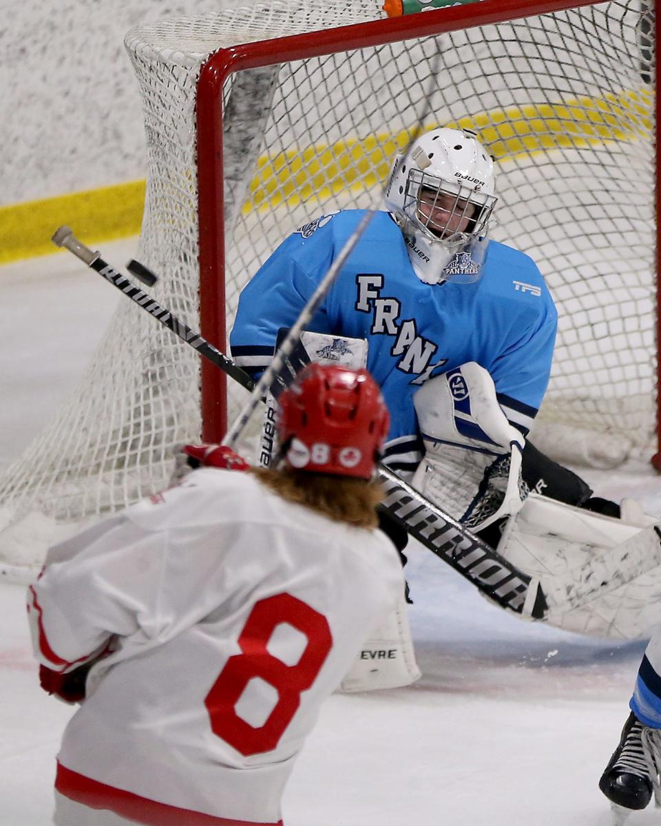 Franklin goalie Cole Pouliot-Porter gets in position for the save during third period action of the Division 1 Sweet 16 game at Canton Ice House on Tuesday, March 8, 2022. 